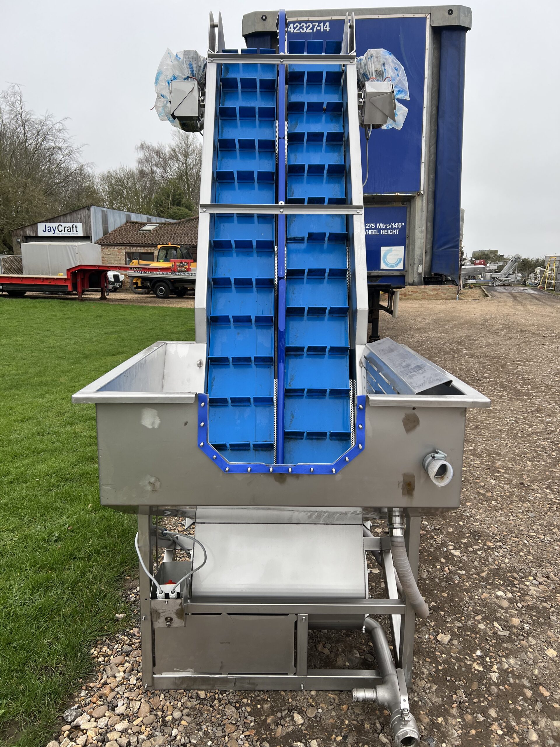 Elevator with Flume System